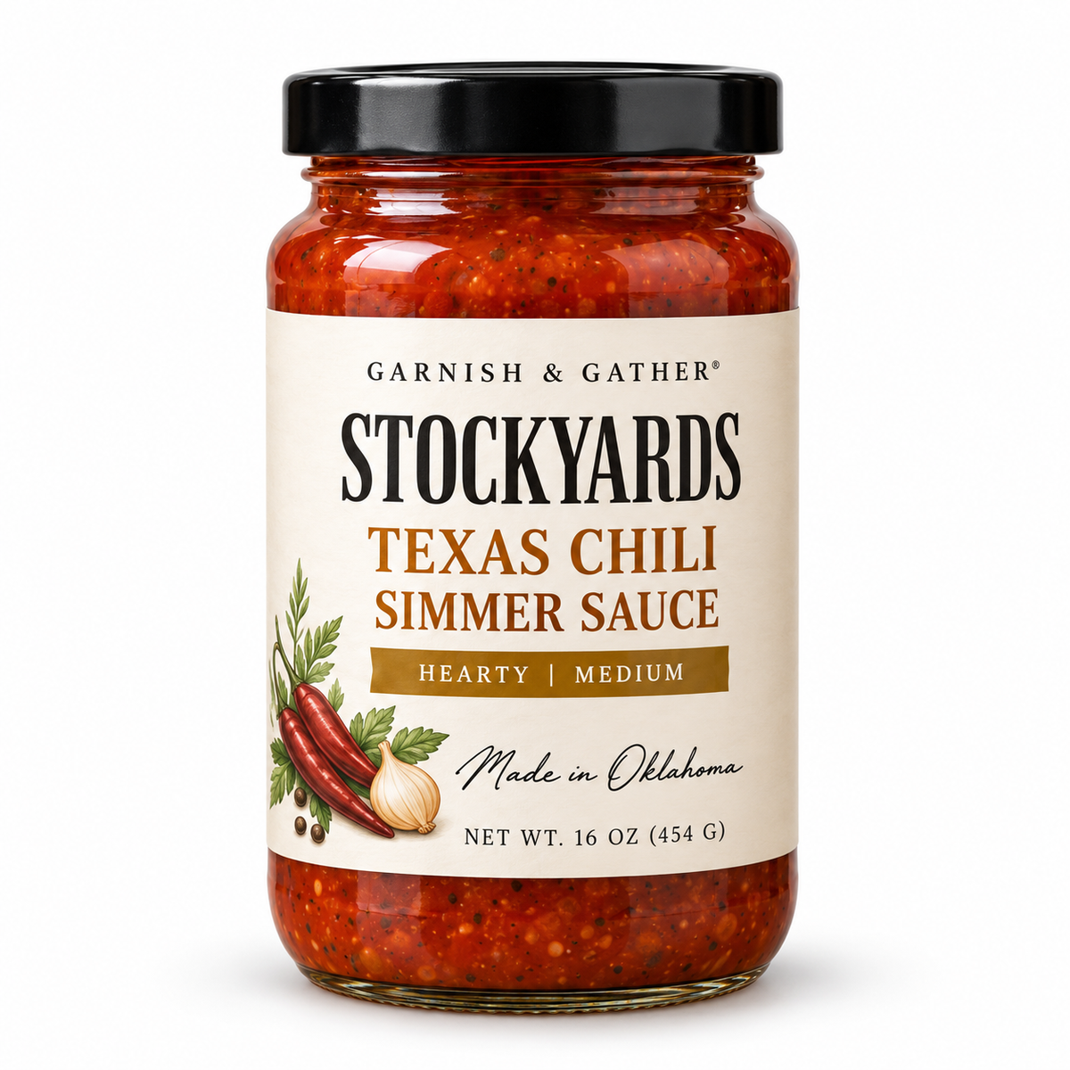 Garnish & Gather Stockyards Texas Chili Simmer Sauce, 16 oz jar with a black lid, chili pepper and onion artwork, and a Hearty | Medium label.